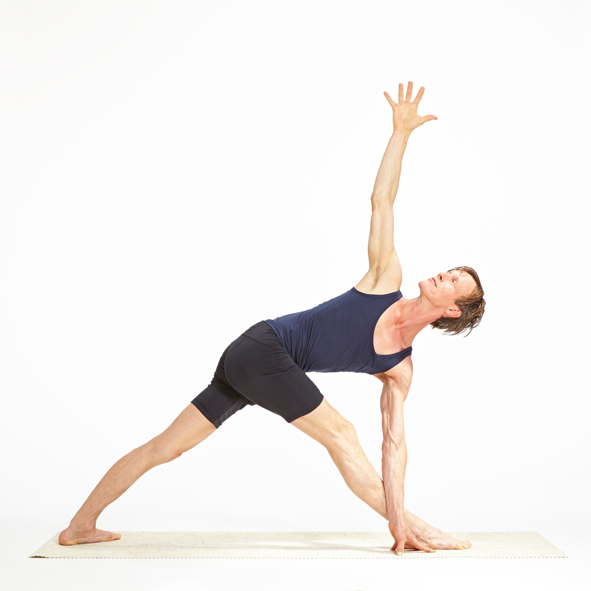 Yoga Pose: Revolved Triangle Pose | YogaClassPlan.com