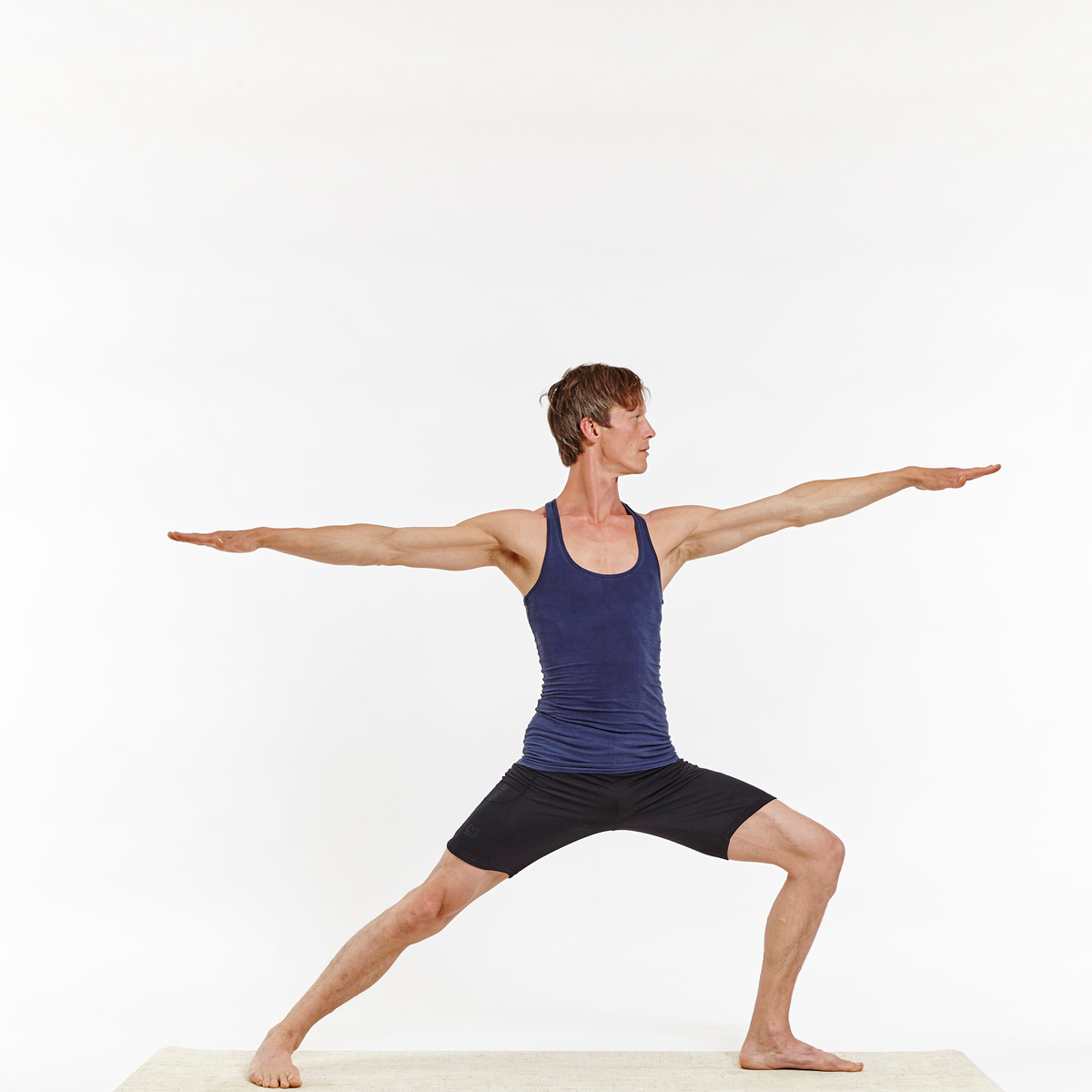 How The Warrior II Pose Can Improve Digestion